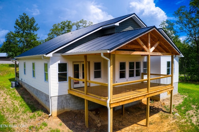 760 Rockview Rd, Jamestown, TN 38556 - rear view of property with a metal roof and a wooden deck