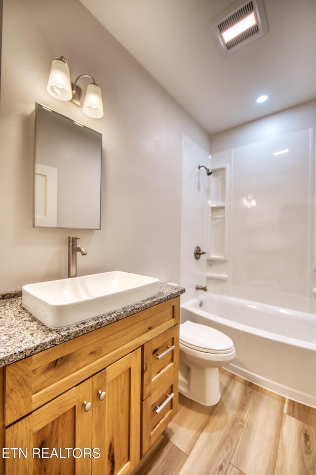 760 Rockview Rd, Jamestown, TN 38556 - bathroom with wood finished floors, vanity, and shower / tub combination