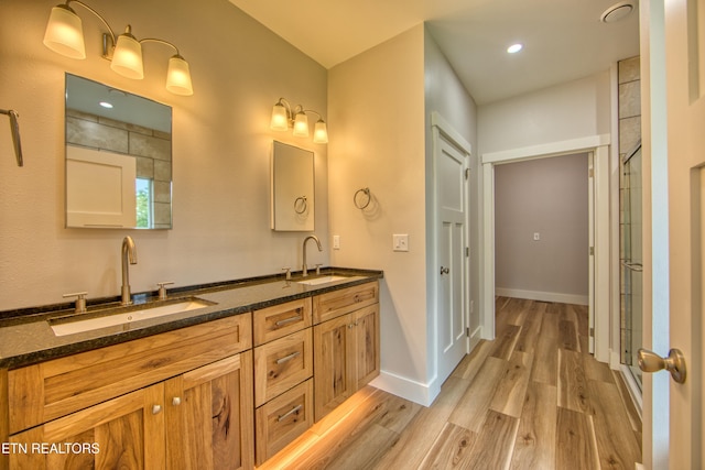760 Rockview Rd, Jamestown, TN 38556 - bathroom featuring wood finished floors and double vanity