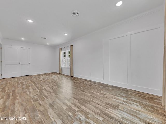 1100 Cedar Ln, Knoxville, TN 37912 - unfurnished room with ornamental molding, light wood-type flooring, and recessed lighting