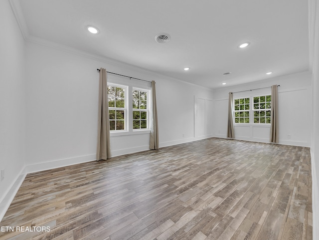 1100 Cedar Ln, Knoxville, TN 37912 - spare room featuring wood finished floors, ornamental molding, and recessed lighting
