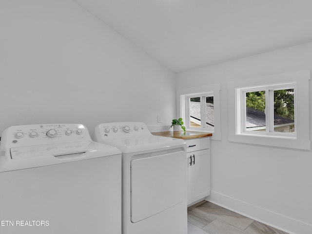 1100 Cedar Ln, Knoxville, TN 37912 - laundry room with washing machine and clothes dryer and cabinet space