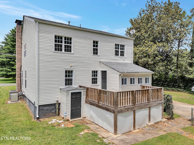 1100 Cedar Ln, Knoxville, TN 37912 - rear view of property featuring a deck, a yard, and roof with shingles
