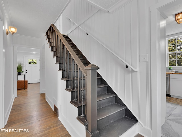 1100 Cedar Ln, Knoxville, TN 37912 - stairway with wood finished floors and ornamental molding