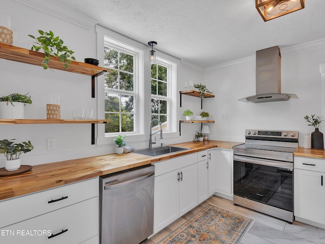 1100 Cedar Ln, Knoxville, TN 37912 - kitchen featuring open shelves, wooden counters, stainless steel appliances, wall chimney range hood, and white cabinetry