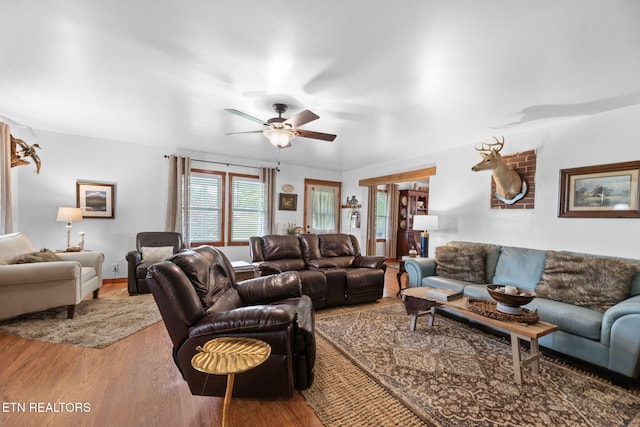 1292 Deer Lodge Hwy, Sunbright, TN 37872 - living area featuring wood finished floors and a ceiling fan