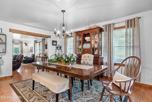 1292 Deer Lodge Hwy, Sunbright, TN 37872 - dining space with a chandelier and light wood-type flooring