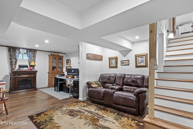 1292 Deer Lodge Hwy, Sunbright, TN 37872 - living area with wood finished floors, stairway, recessed lighting, and a fireplace