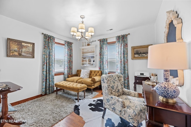 1292 Deer Lodge Hwy, Sunbright, TN 37872 - living room with a chandelier and wood finished floors