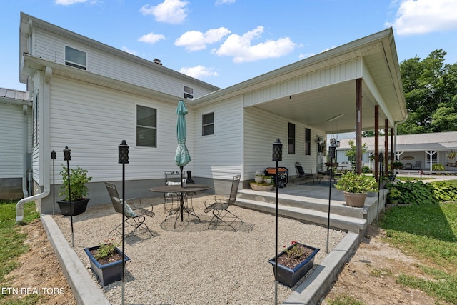 1292 Deer Lodge Hwy, Sunbright, TN 37872 - back of property with a patio area