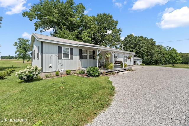 1292 Deer Lodge Hwy, Sunbright, TN 37872 - ranch-style house with a front lawn, crawl space, driveway, and a metal roof