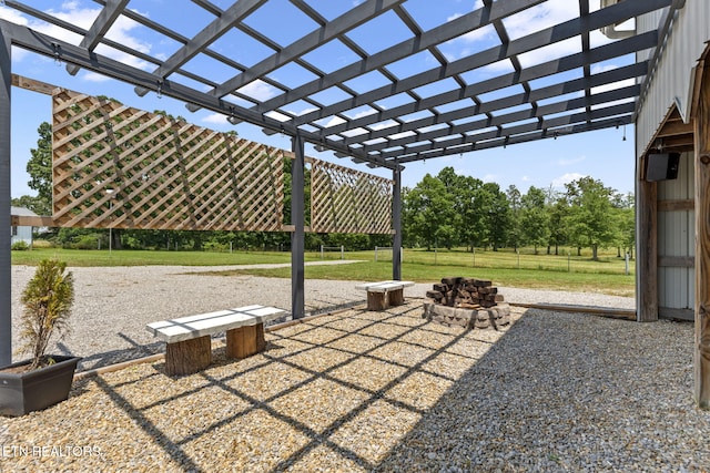 1292 Deer Lodge Hwy, Sunbright, TN 37872 - view of patio featuring a pergola and an outdoor fire pit