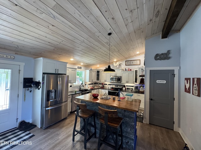 669 Crooked Branch Pvt Rd, Huntsville, TN 37756 - kitchen with appliances with stainless steel finishes, wood ceiling, dark wood-type flooring, glass insert cabinets, and wood counters
