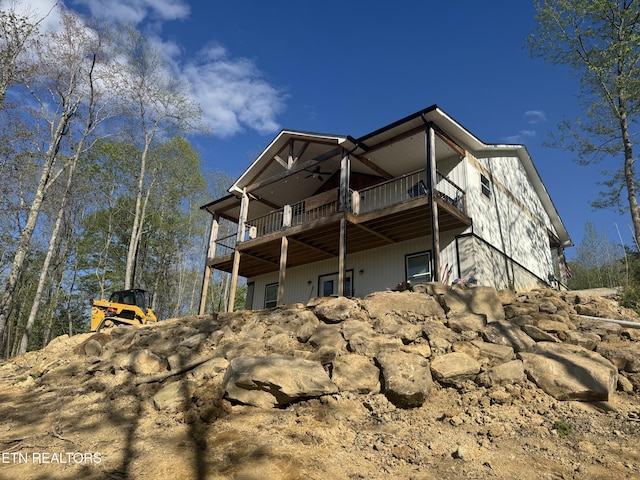 669 Crooked Branch Pvt Rd, Huntsville, TN 37756 - back of house featuring ceiling fan and a deck