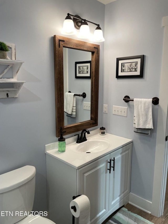 669 Crooked Branch Pvt Rd, Huntsville, TN 37756 - bathroom with toilet and vanity