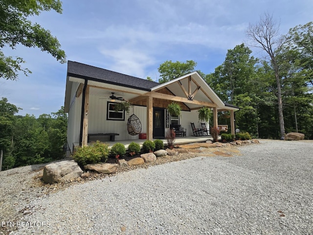 669 Crooked Branch Pvt Rd, Huntsville, TN 37756 - view of front of house featuring ceiling fan, a shingled roof, and a porch