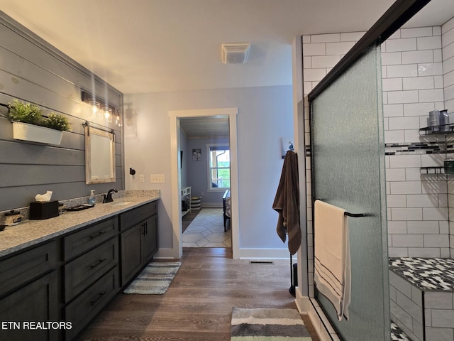 669 Crooked Branch Pvt Rd, Huntsville, TN 37756 - bathroom with wood finished floors, ensuite bath, vanity, and a shower stall