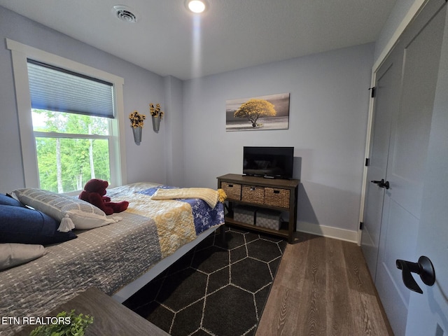 669 Crooked Branch Pvt Rd, Huntsville, TN 37756 - bedroom with dark wood finished floors and baseboards
