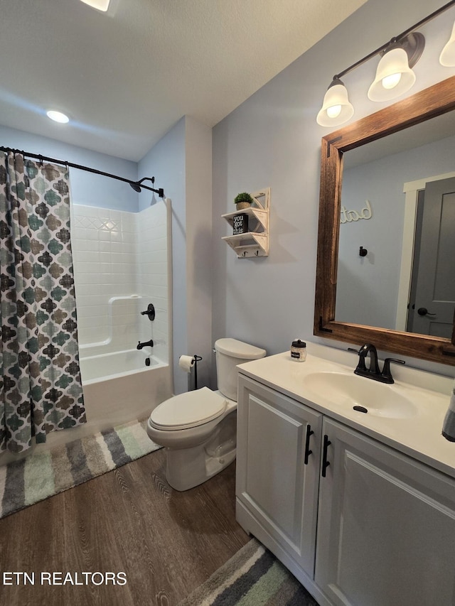 669 Crooked Branch Pvt Rd, Huntsville, TN 37756 - bathroom with wood finished floors, vanity, and shower / bath combination with curtain