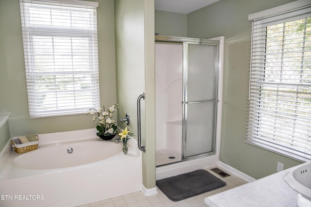 20 Dockside Dr, Fairfield Glade, TN 38558 - full bathroom with a shower stall, a bath, vanity, and tile patterned floors