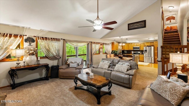 573 Hilltop Dr, Jacksboro, TN 37757 - living area featuring ceiling fan, stairway, and high vaulted ceiling
