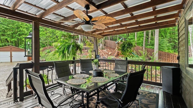 573 Hilltop Dr, Jacksboro, TN 37757 - deck with a ceiling fan, outdoor dining area, an outdoor structure, and a garage