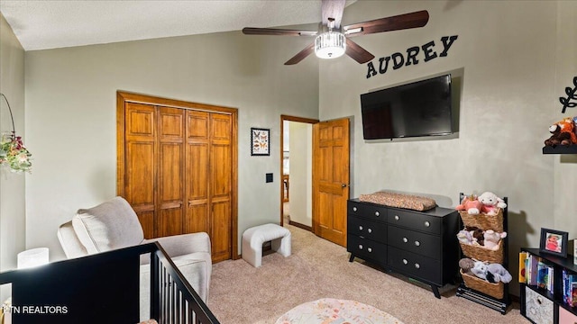 573 Hilltop Dr, Jacksboro, TN 37757 - carpeted bedroom with a closet, ceiling fan, and high vaulted ceiling