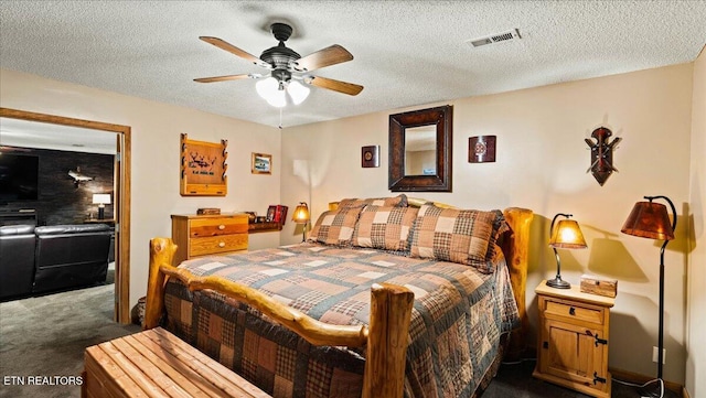 573 Hilltop Dr, Jacksboro, TN 37757 - bedroom featuring dark carpet, a textured ceiling, and ceiling fan