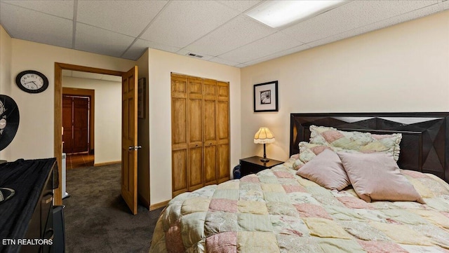 573 Hilltop Dr, Jacksboro, TN 37757 - carpeted bedroom featuring a closet and a paneled ceiling