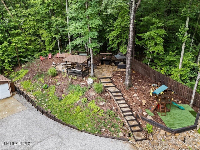 573 Hilltop Dr, Jacksboro, TN 37757 - view of yard featuring a playground and stairs