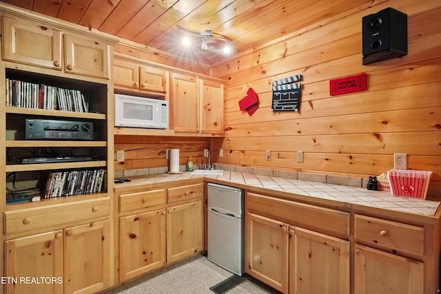 1930 Orchard Dr, Sevierville, TN 37876 - kitchen featuring wood ceiling, white microwave, tile counters, fridge, and light brown cabinetry