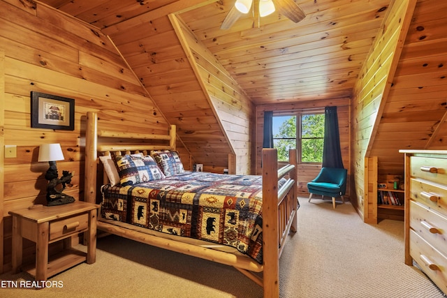 1930 Orchard Dr, Sevierville, TN 37876 - bedroom with light colored carpet, wooden walls, wood ceiling, and vaulted ceiling