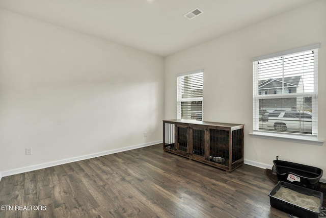 3235 NE Rolling Meadow Way, Cleveland, TN 37323 - unfurnished living room with dark wood-style flooring and baseboards