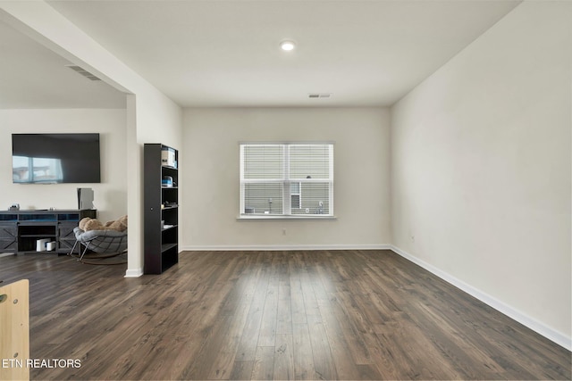 3235 NE Rolling Meadow Way, Cleveland, TN 37323 - unfurnished living room with dark wood finished floors and baseboards