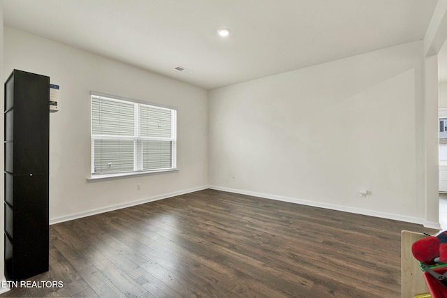3235 NE Rolling Meadow Way, Cleveland, TN 37323 - unfurnished room featuring dark wood-style floors and recessed lighting
