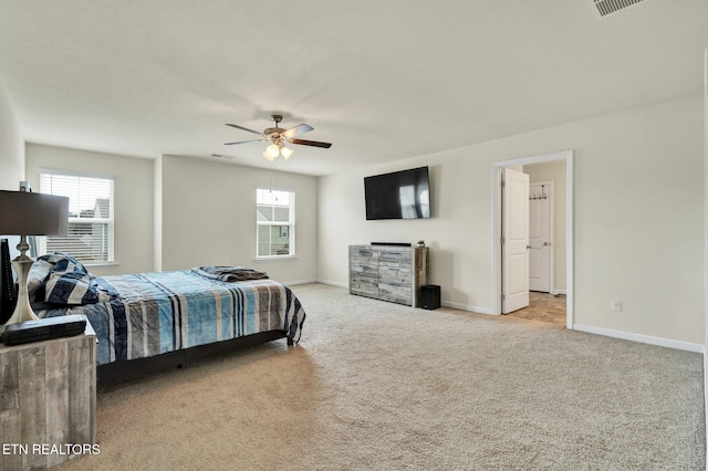 3235 NE Rolling Meadow Way, Cleveland, TN 37323 - carpeted bedroom featuring multiple windows and a ceiling fan