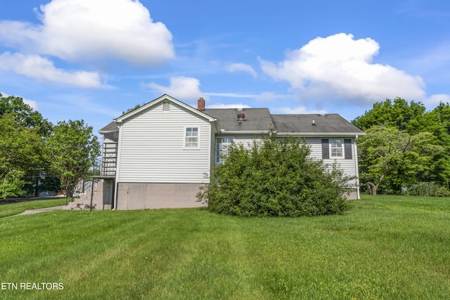 7518 Clapps Chapel Rd, Corryton, TN 37721 - back of property with a yard and a chimney