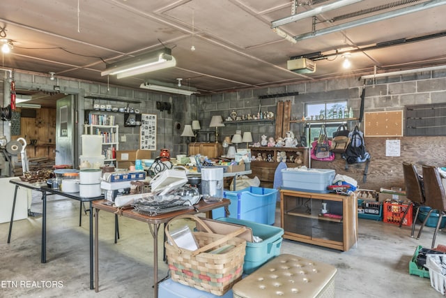 7518 Clapps Chapel Rd, Corryton, TN 37721 - garage with a garage door opener and concrete block wall