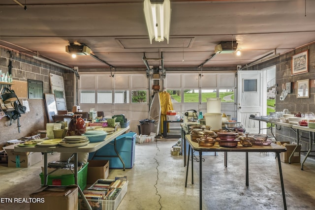7518 Clapps Chapel Rd, Corryton, TN 37721 - garage featuring concrete block wall and a garage door opener