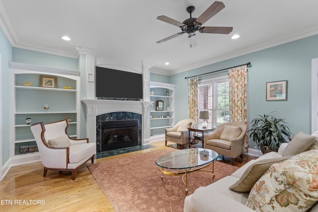 232 Park Meade Pl, Oak Ridge, TN 37830 - living room featuring crown molding, wood finished floors, a premium fireplace, ceiling fan, and recessed lighting
