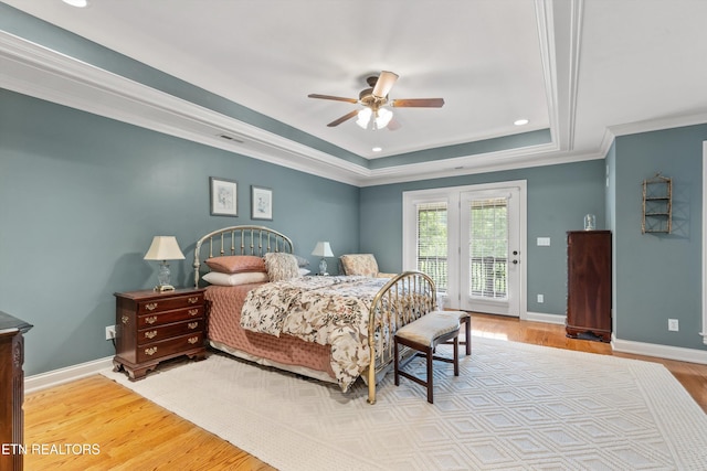 232 Park Meade Pl, Oak Ridge, TN 37830 - bedroom featuring a tray ceiling, access to exterior, wood finished floors, ceiling fan, and ornamental molding
