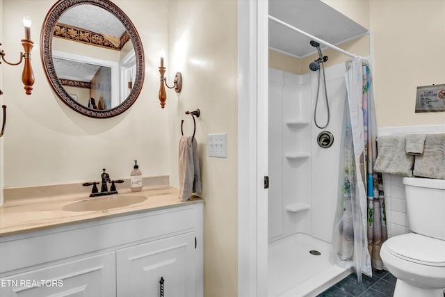3950 Castle Rd, Gatlinburg, TN 37738 - bathroom with vanity, curtained shower, tile patterned flooring, and tile walls