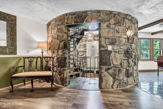 3950 Castle Rd, Gatlinburg, TN 37738 - entryway with wood-type flooring, a textured ceiling, and lofted ceiling