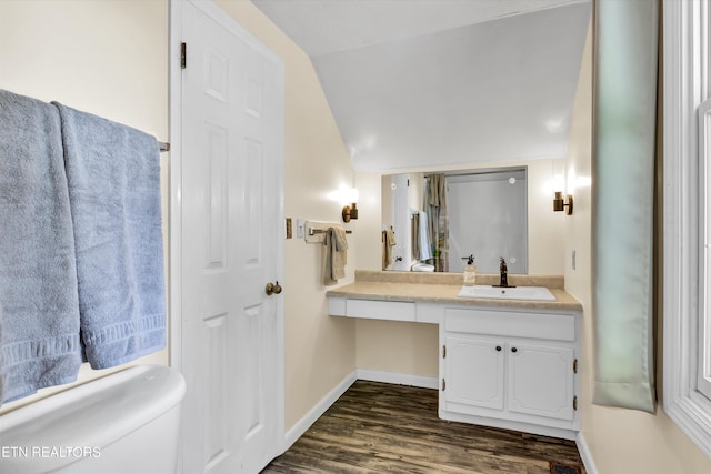 3950 Castle Rd, Gatlinburg, TN 37738 - bathroom featuring vaulted ceiling, wood finished floors, and vanity