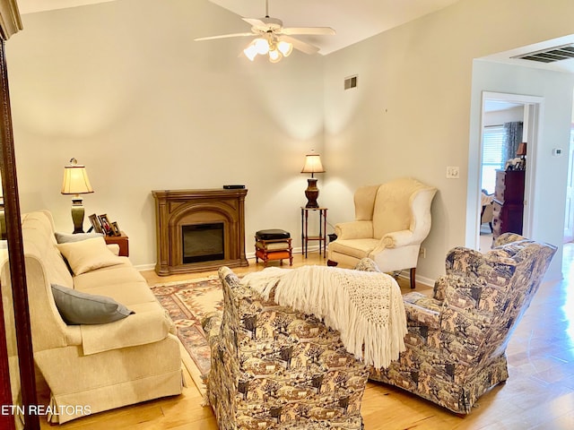 209 Commander Way, Knoxville, TN 37934 - living area with a ceiling fan, light wood-style floors, a fireplace, and lofted ceiling