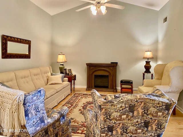 209 Commander Way, Knoxville, TN 37934 - living area featuring ceiling fan, light wood-style flooring, high vaulted ceiling, and a glass covered fireplace