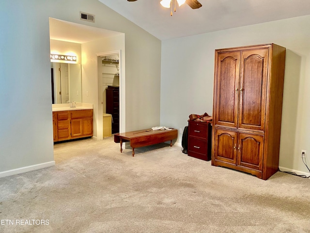 209 Commander Way, Knoxville, TN 37934 - living area featuring ceiling fan, light carpet, and vaulted ceiling