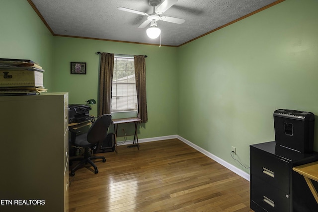 113 Skyland Ln, Powell, TN 37849 - office with wood finished floors, ornamental molding, a ceiling fan, and a textured ceiling