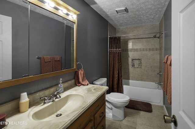 113 Skyland Ln, Powell, TN 37849 - full bathroom featuring vanity, a textured ceiling, shower / tub combo, and tile patterned floors