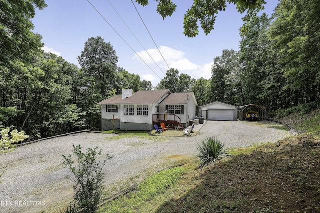 113 Skyland Ln, Powell, TN 37849 - view of front of property with an outbuilding, a carport, crawl space, driveway, and a chimney